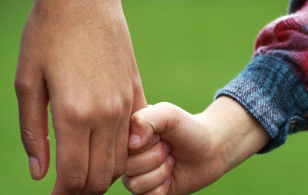 SVP-child-holding-parents-hand