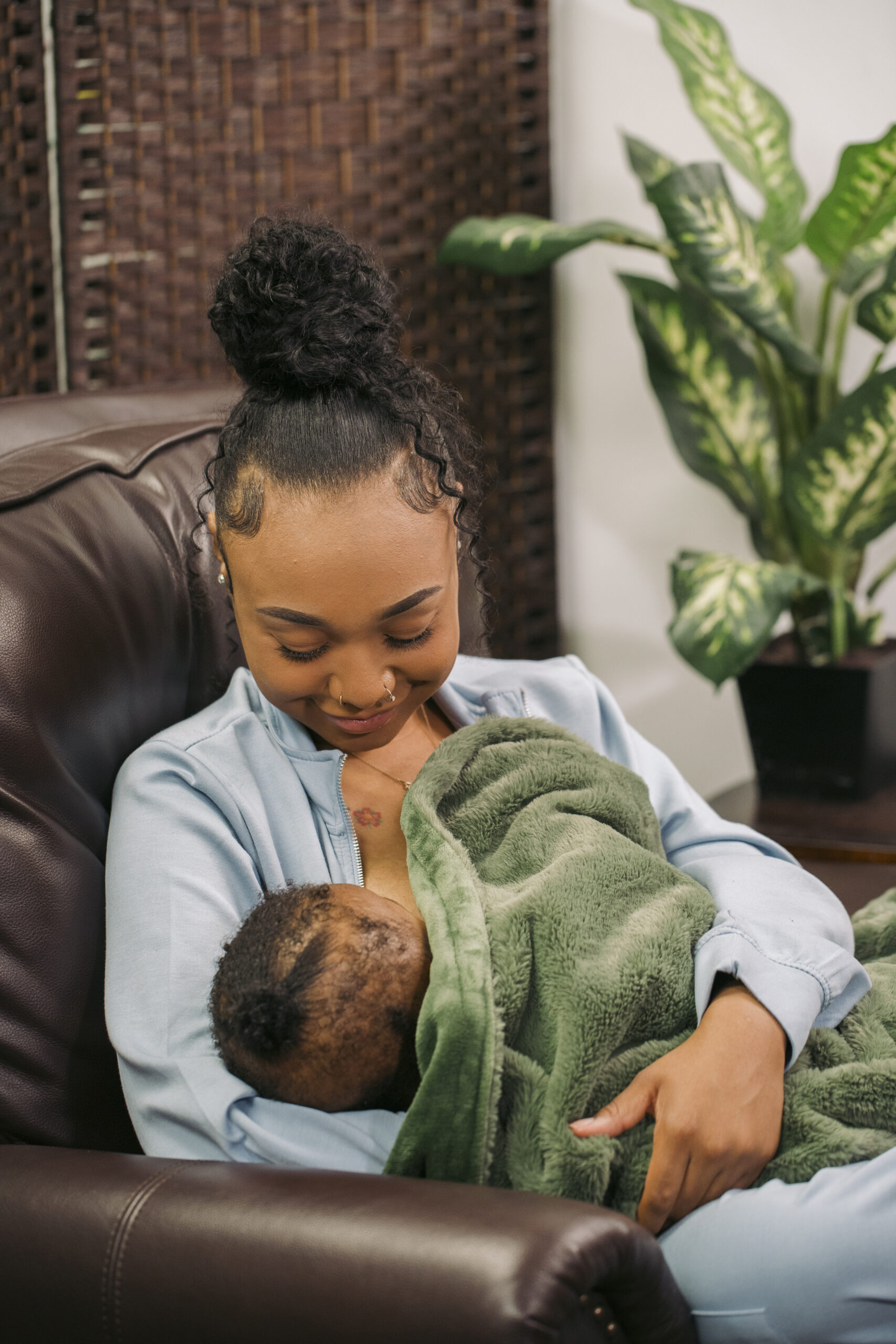 Mother breastfeeding at WIC office
